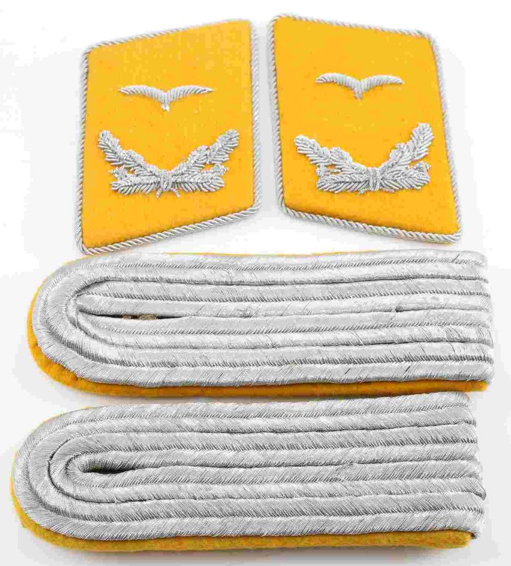 WWII GERMAN THIRD REICH PARATROOPER LOT OF TWO: WWII German Third Reich Paratrooper Collar Tab and Shoulder Board lot of two. Lot includes one pair of Officer collar tabs and one pair of shoulder boards. Some mothing is present on the shoulder boar