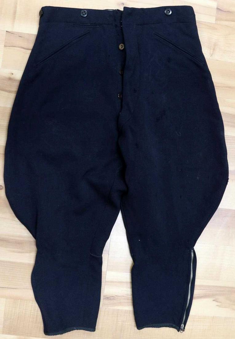 WWII GERMAN PANZER KORPS LEATHER TROUSERS: German Panzer Korps leather trousers. Interior NSDAP stamped on interior of back pocket, however time and fading have left these marks largely indicernable. High waisted with suspenders all buttons pr