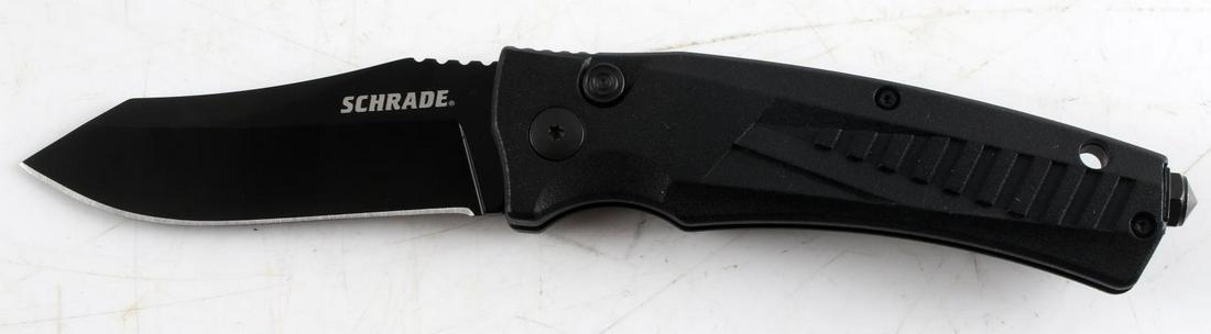 SCHRADE SWITCHBLADE AUS 8 SC90 B KNIFE: Schrade Switchblade AUS-8. Button controls the locking and unlocking mechanism. Belt clip for carrying purposes. Window smasher on reverse side, Blade measures 3 inches and 7.25 inches overall. Very g