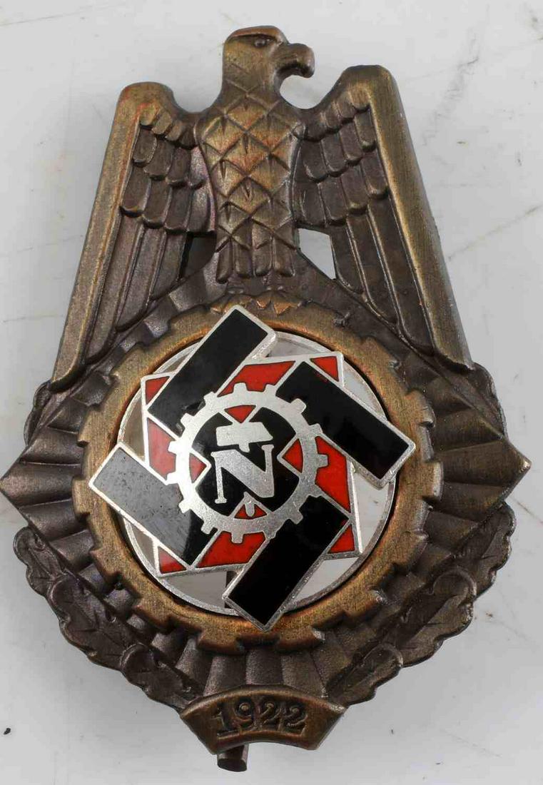 WWII GERMAN THIRD REICH TENO HONOR BADGE ENAMEL: German World War II 1922 Technical Emergency Service TENO Badge. Measures 1 1/2" inches wide by 1 15/16” inches tall. Has a wide vertical pin back that is maker marked ‘Karl Hensler Pforzheim’.