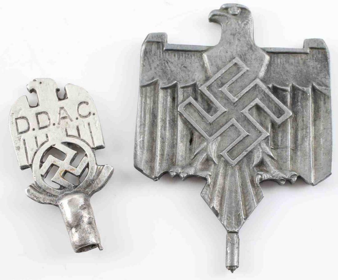 WWII GERMAN THIRD REICH FLAG POLE TOPS LOT OF 2: Group of 2 German WWII flag pole tops. One is DDAC (German Automobile Association). Another - NSDAP, for a car flag. Unauthenticated, sold as is. This lot has a reserve.