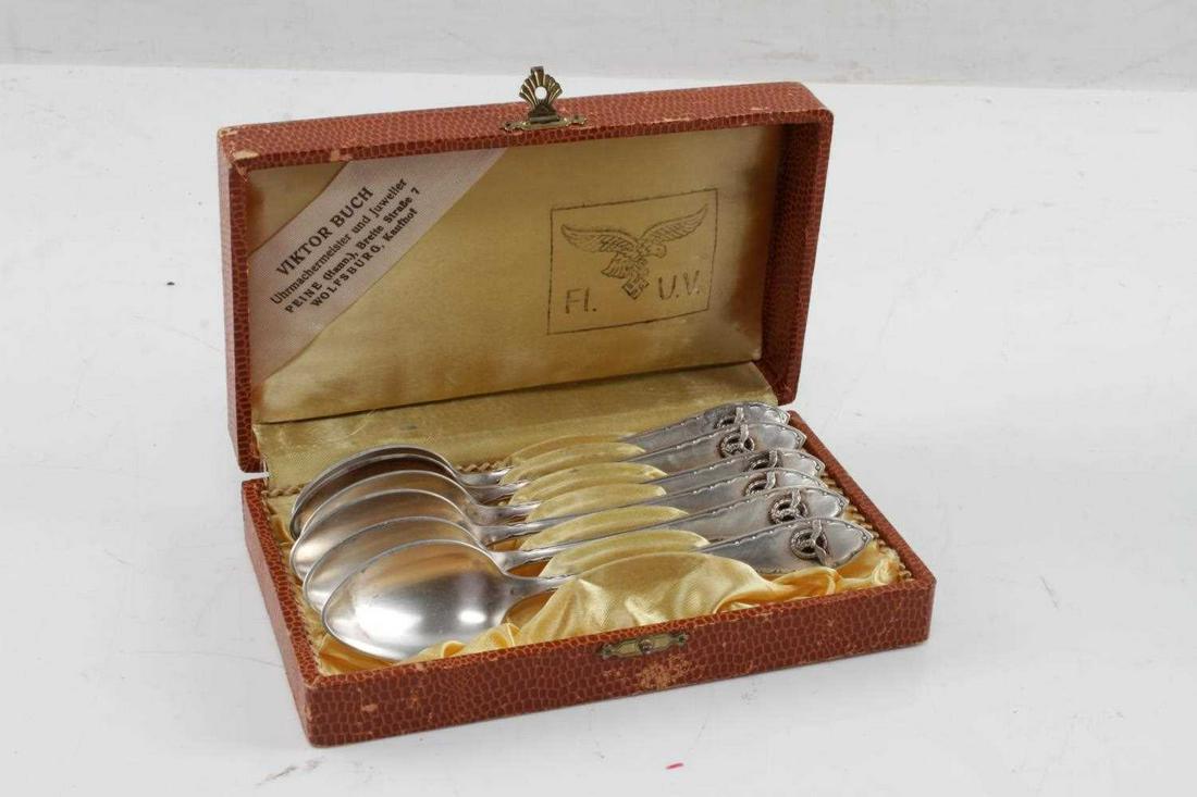 WWII GERMAN THIRD REICH LUFTWAFFE PILOT SILVERWARE: WWII German Third Reich Luftwaffe Pilot Officer Silverware. The silverware comes with the original box and is stamped "Viktor Burch FL UV". The spoons measure 6 inches and the box measures 6.75 by 4 i