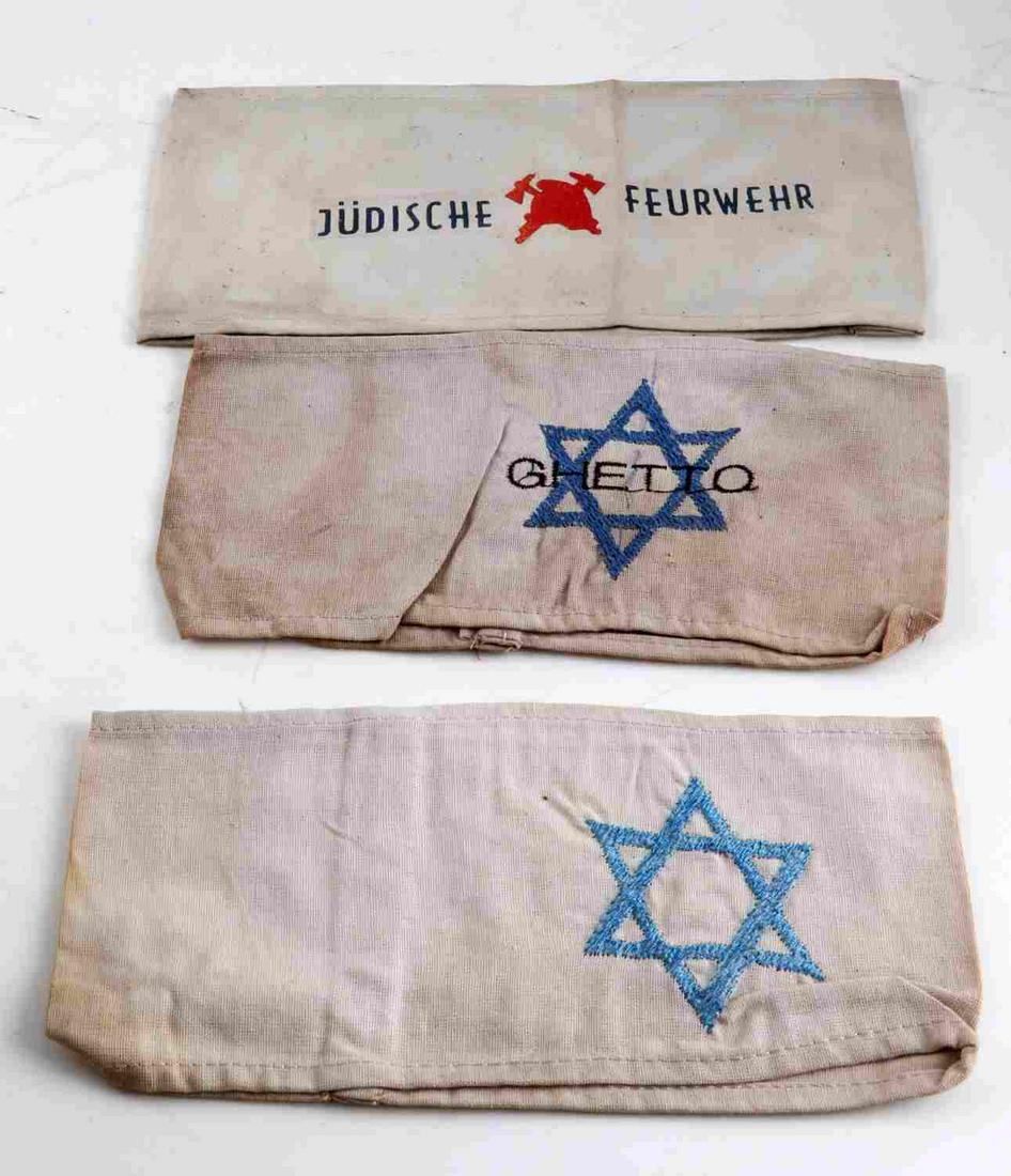 WWII GERMAN THIRD REICH HOLOCAUST ARM BANDS LOT 3: WWII German Third Reich Holocaust period arm bands lot 3. Contains Jewish Fire Brigade, Ghetto, Star of David. Unauthenticated. Sold as is. This lot has a reserve.