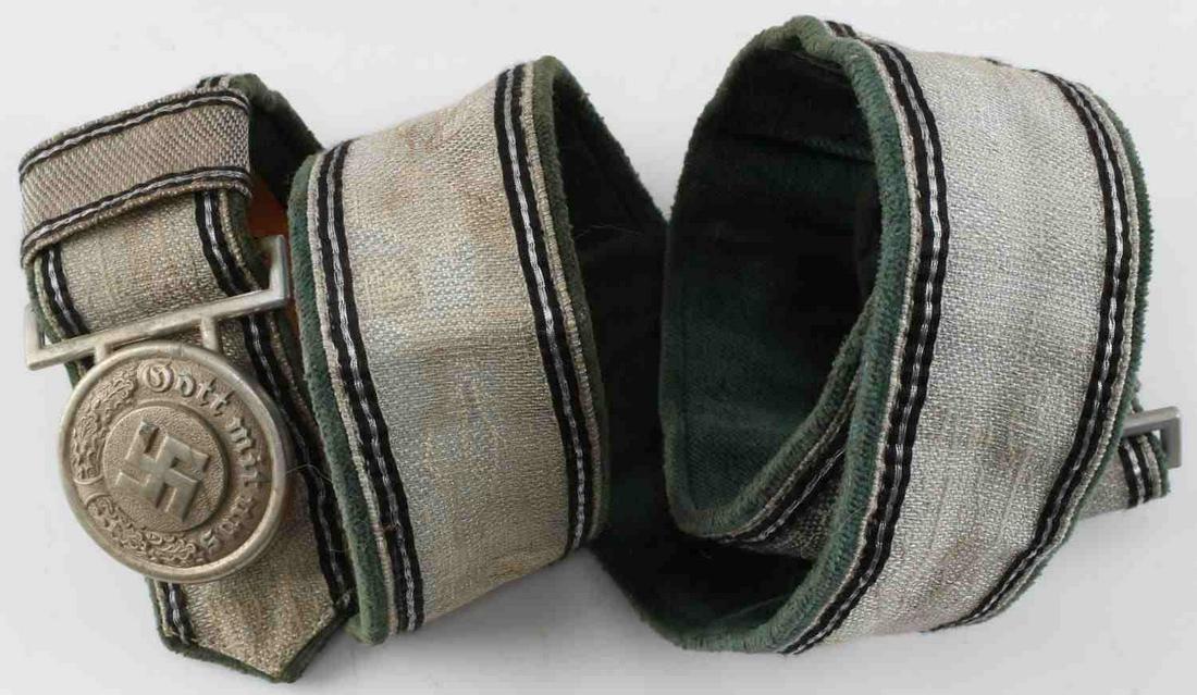 WWII GERMAN THIRD REICH POLICE BELT AND BUCKLE: WWII German Third Reich Police Officer's belt and buckle. Belt is made of fabric with some leather. Inscription reads "Gott mot uns" (God with us). Some rust. Unauthenticated. Sold as is. This lot has