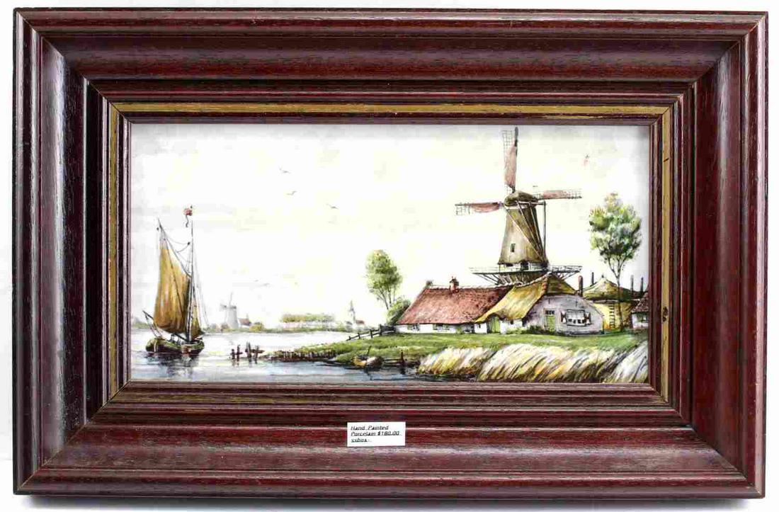 HAND PAINTED CERAMIC TILE PLATE DELFT POLYCHROME: One framed, hand-painted ceramic tile plate in Delft polychrome measuring 15 inches by 9 inches. The original label on the back of frame reveals the name of the manufacturer "Westraven Anno 1661", a D