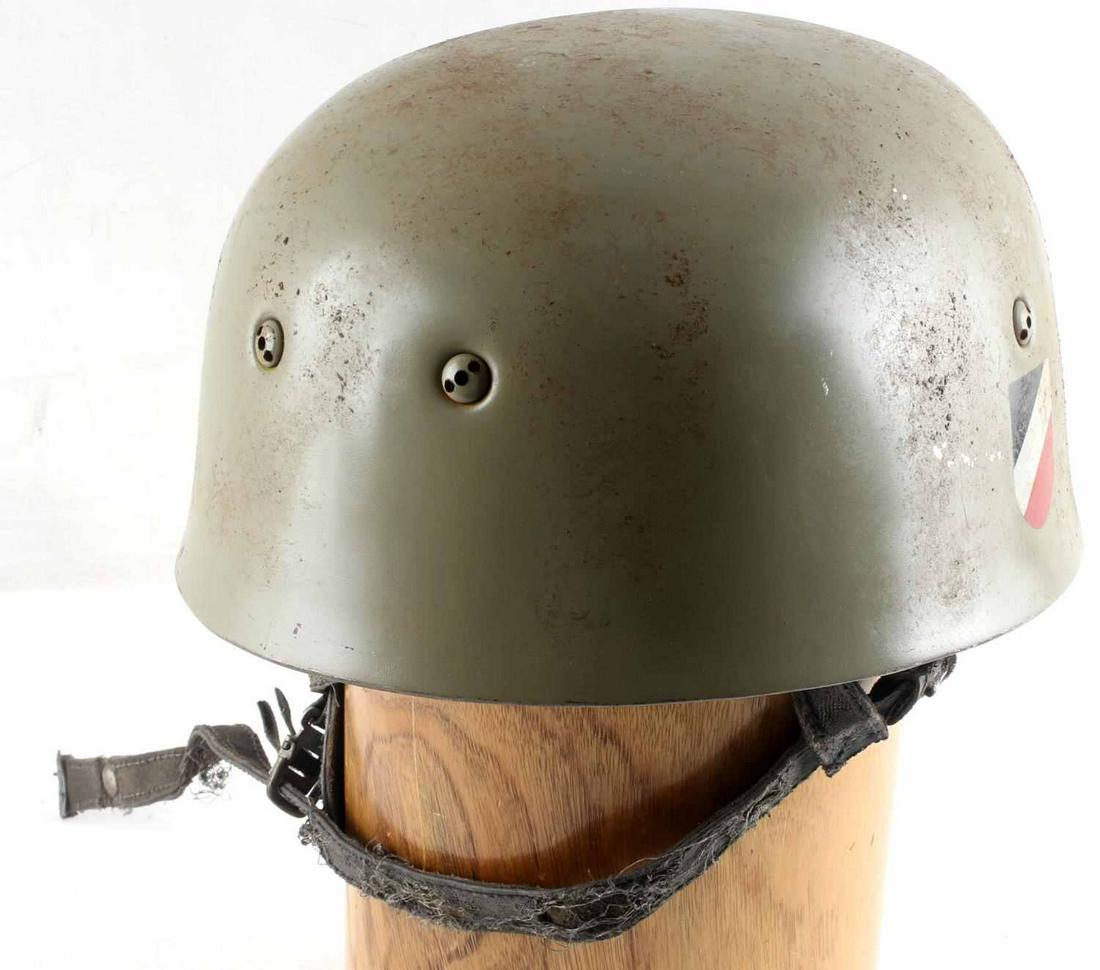WWII GERMAN THIRD REICH M35 AFRIKA KORPS HELMET: SS Fallshirmjaeger paratrooper Afrika Korps M 35 steel helmet, with national flag shield and Afrika Korps symbol. Inside lining measures 7 cm in diameter and is stamped "head width 60 cm, steel helmet
