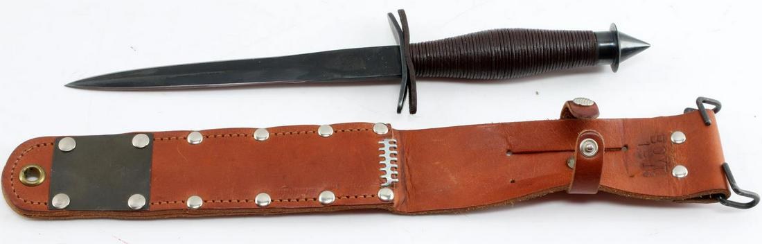 WWII V 42 COMMANDO STILETTO FIGHTING KNIFE: WWII V-42 Commando Stiletto Fighting Knife. The knife comes with a leather scabbard stamped "Boyt 1943". The blade measures 7 inches in length and 12.5 inches in total. The dagger is in very good cond