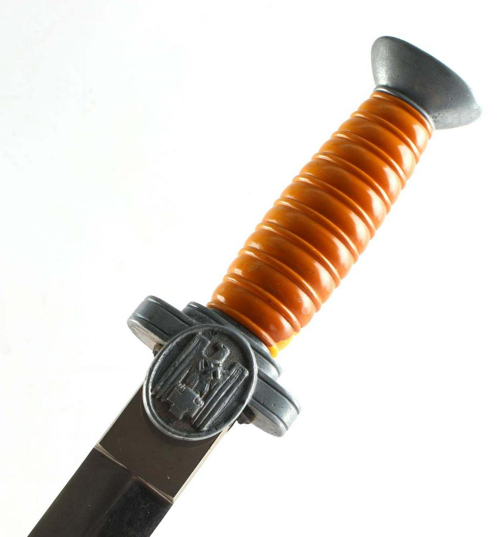 WWII THIRD REICH GERMAN RED CROSS DAGGER BAKELITE: Rote Kreuz (Red cross) medical leader's dagger with blade measuring 10 inches and 14.5 inches in total with bakelite handle. Blade has some tarnishing and ricasso and pommel have some chipping. This d