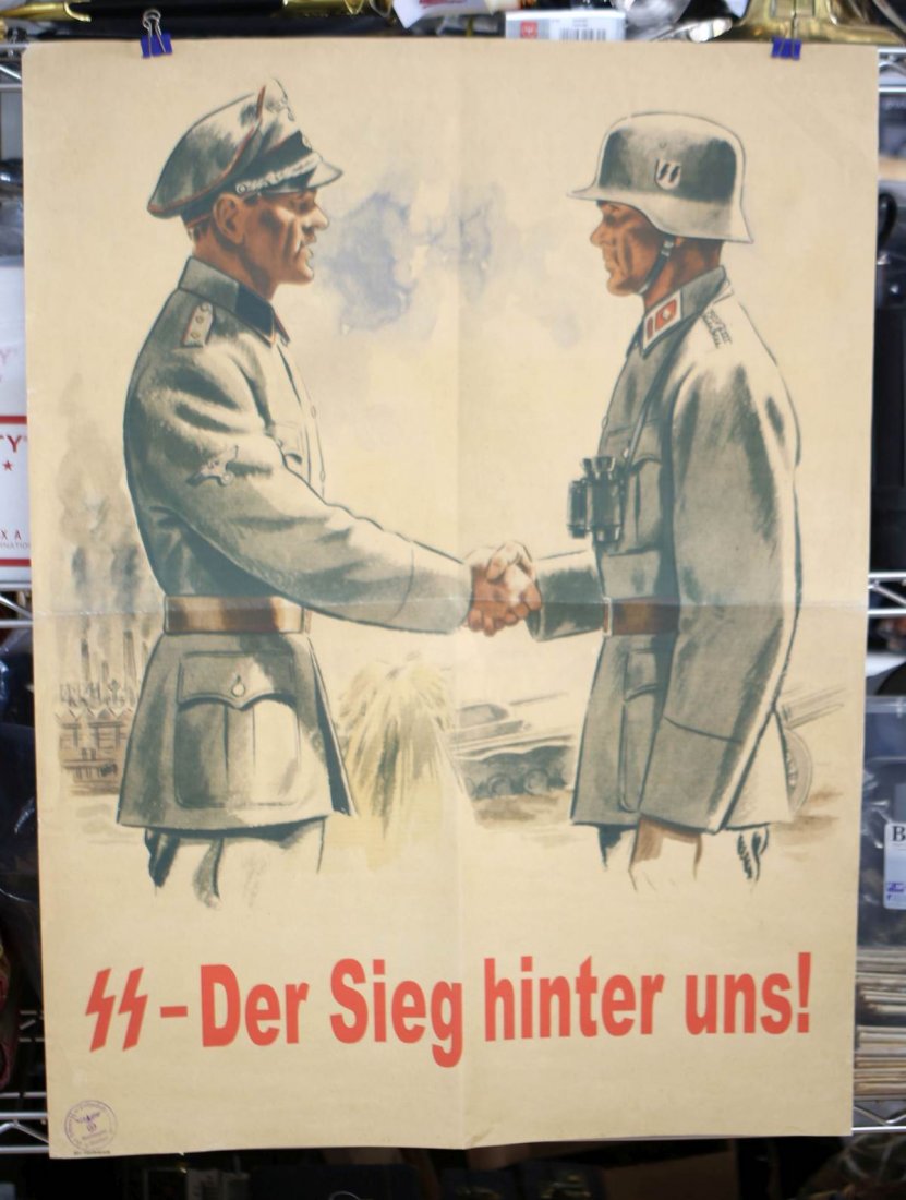 WWII GERMAN SS TROOPS PROPAGANDA POSTER: Propaganda poster promoting SS troops with "The victory is behind us". 29 x 22 inches. Stamped with an SS post office stamp as well as the number 92c Handruck (plate printed). Some wear. Good overall 