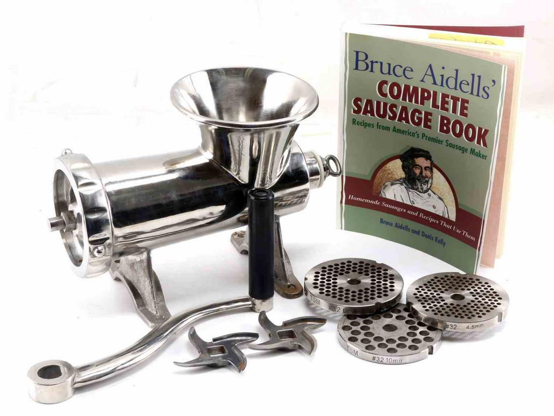 STAINLESS STEEL MEAT GRINDER AND SAUSAGE COOKBOOK: Stainless steel meat grinder with 3 blade attachments. Blades are TSM #32 4.5mm, 6mm, 10mm. Pre owned in good condition. Table mount with hand crank measuring 13x8x7 inches, measurement does not inclu