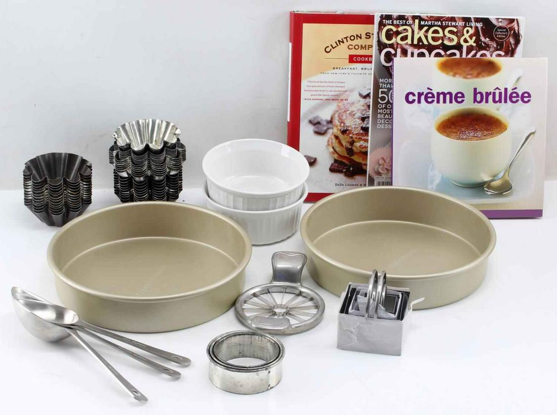 MUFFIN CUPS & CREME BRULEE & DOUGH ACCESSORIES: Lot of approximately 50 metallic muffin baking cups, two 9.5 inch Williams Sonoma cake pans, two ceramic creme brulee baking dishes, two Amco muffin measuring spoons, one empanada or pierogi dough mak