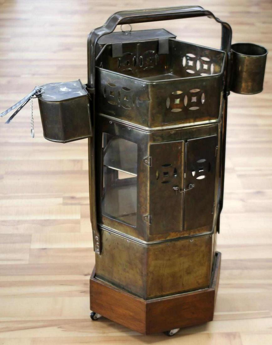 ANTIQUE CHINESE HEXAGONAL BRASS NOODLE CART: Antique Chinese brass noodle cart used to serve and cook dim sum. Measures: Height 28" inches, Width 18" inches, Diameter 19" inches. Has a hexagonal body, with four glass panel inserts on the sides, 