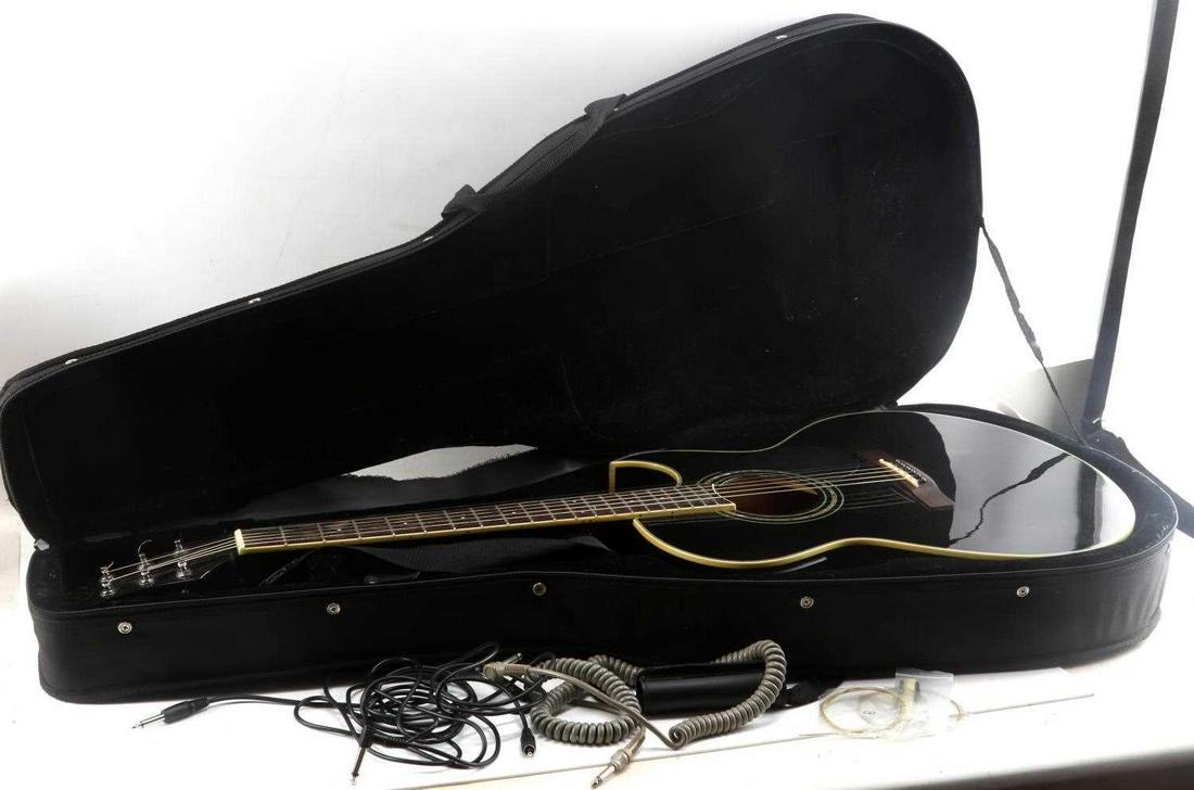 GREG BENNETT DESIGN LCD TUNED ACOUSTIC GUITAR: Greg Bennett Design Model TMJ-5CE/BK LCD Tuned Acoustic Guitar. Guitar measures 41 inches long and 16 inches wide at the base. Grover tuning keys. Very good condition.