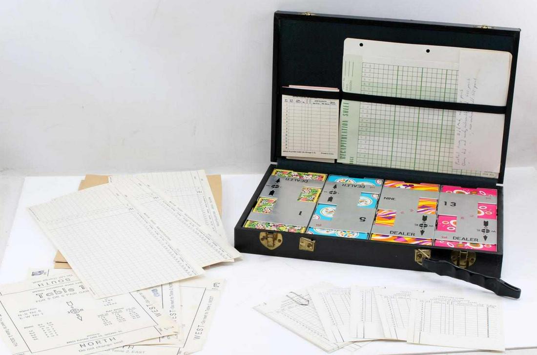VINTAGE VUL DUPLICATE METAL BRIDGE CARD GAME SET: Vintage VUL Duplicate Metal Bridge Set. 28 sets of cards and score sheets. The case measures 15 by 10 by 2.5 inches. Handle on the case is broken but, the game is in very good condition.