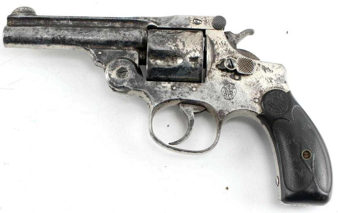 SMITH & WESSON DA 2ND MOD TOP BREAK REVOLVER .38: Circa 1880-1884. Nickel finish with scattered patina, two-line patent dates to top rib with Sept. 14 09 as the last, bakelite grips, 3.25 inch barrel with dark bore. Serial number to butt. Top break i