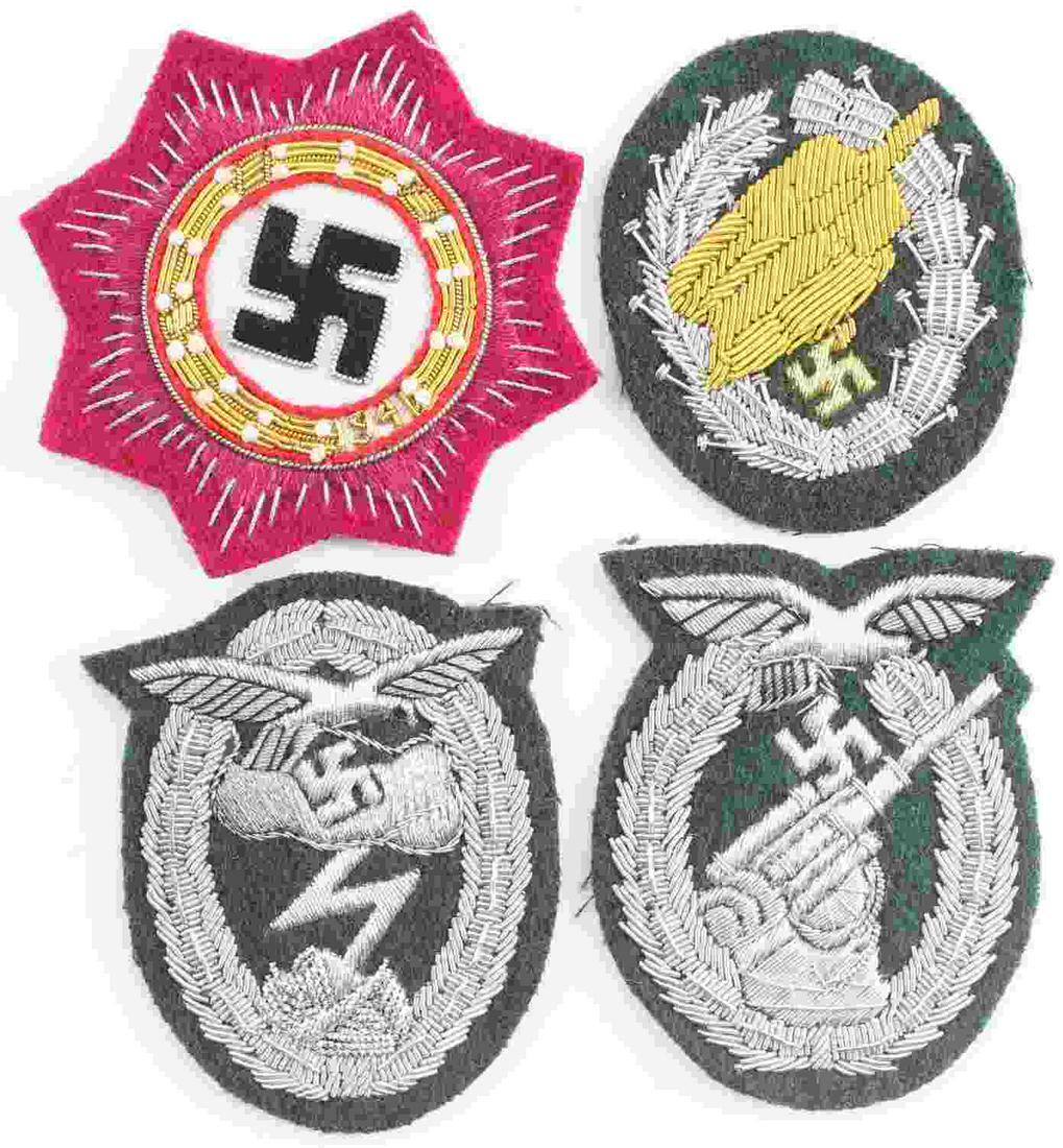 WWII GERMAN SS ARTILLERY LUFTWAFFE COMBAT BADGES: WWII German Luftwaffe combat badges in bullion wire lot of 4. Includes; Luftwaffe Flak Artillery badge, Luftwaffe ground combat badge, Luftwaffe Paratrooper Fallschirmjager badge. Also includes a clot