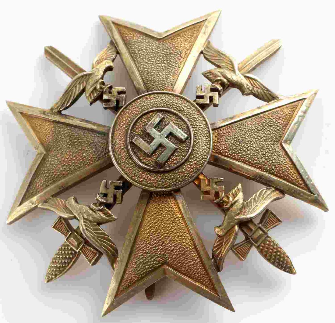WWII GERMAN THIRD REICH SPANISH CROSS IN GOLD: WWII German Third Reich Spanish Cross in Gold with Swords. Separaetly attached eagles and nice concave shape. Nice patina. Showing some wear to the front. Hermann Barth piece marked L/11. Very good co