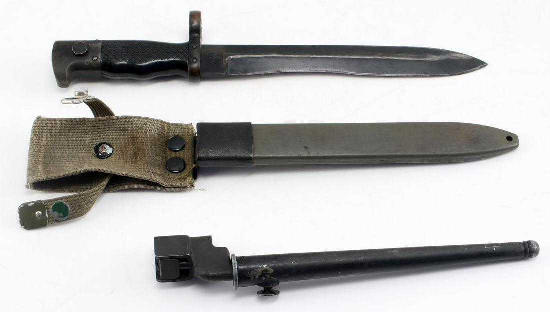WWII BRITISH SPIKE BAYONET & SPANISH CETME BAYONET: WWII British spike Enfield bayonet and scabbard, the blade measuring 7.75 inches, overall length 10 inches, whose condition is commensurate with the age. Fully functional WWII Spanish CETME bayonet an
