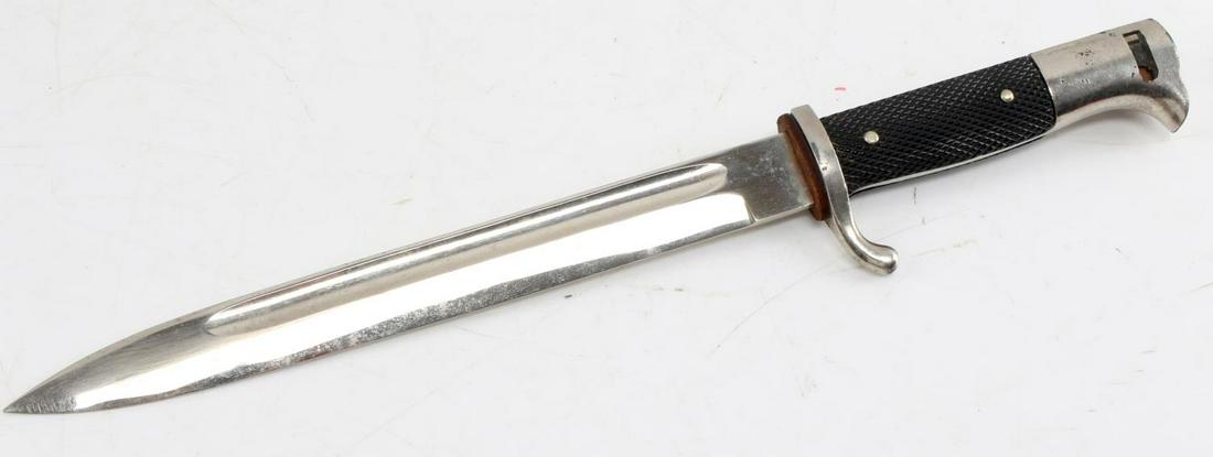 WWII GERMAN FIREMANS DRESS BAYONET THIRD REICH: Walking out bayonet. Blade measures 9.5 inches and overall measures 14.75 inches. Some pitting on pommel and press catch missing.