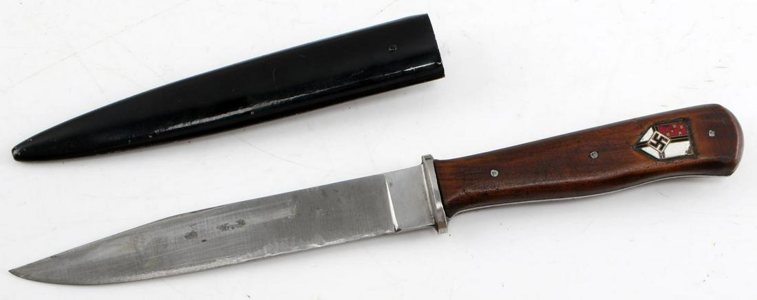 WWII GERMAN THIRD REICH PARTISAN TRENCH BOOT KNIFE: WWII German Third Reich Trench Boot Knife. There is a partisan shield on the left side of the handle. The blade measures 6 inches and the handle measures 4.5 inches. There is some pitting on the blade