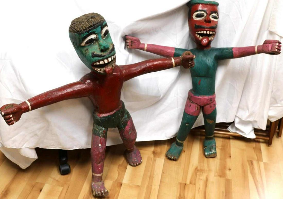 LOT 2 EAST ASIAN HAND PAINTED LARGE WOOD FIGURES: Condition commensurate with age. Indian or Indonesian. Pair stand with outstretched arms and missing what the hands were holding. Both measure 33.5 inches by 10 inches by 33 inches. This lot has a res