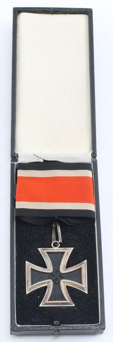 WWII GERMAN THIRD REICH KNIGHTS CROSS ENCASED: WWII German Third Reich Knights Cross Encased with Ribbon. Cross marked with lazy "2" and "800" for silver. The suspension loop is marked "800" as well. Magentic core with some discoloration on the ed