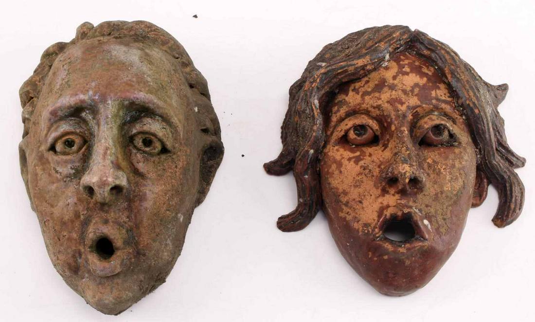 LOT OF 2 HAUNTED CLAY MASK MAN AND WOMAN YARD ART: Two haunted clay masks, decor for your yard or garden. Measure about 7 inches long. Good condition.