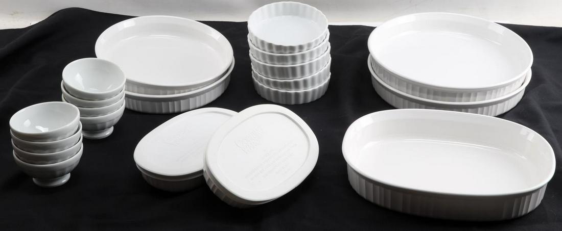 CORNING FRENCH WHITE W HIC FINE CHINA BAKING WARE: Two 8 inch, two 10 inch, five 5 inch, two 15 ounce ovals with lids, eight 3 1/2 inch custard bowls and one large 1.8 liter oval dish. All in good condition