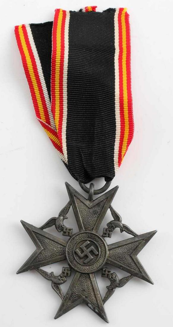 WWII THIRD REICH GERMAN BRONZE SPANISH CROSS HONOR: with issue ribbon measuring 1.5 inches in diameter. Type A in bronze was awarded to the next of kin of a fallen German soldier fighting in the Spanish civil war. Medal is olive brown in color and has