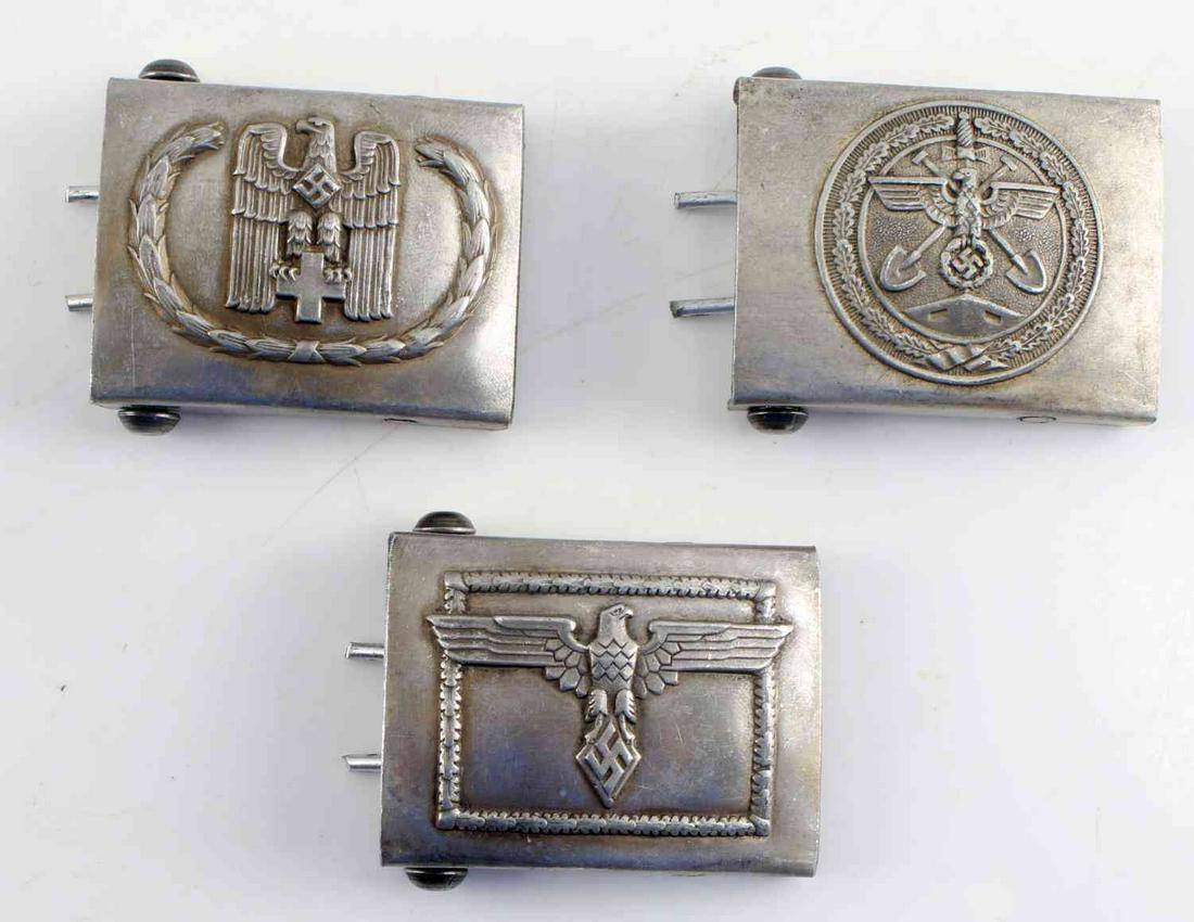WWII THIRD REICH GERMAN HITLER JUGEND BELT BUCKLES: Lot of three WWII German belt buckles measuring 3 inches by 2.5 inches: Hitler Jugend leader, Rote Kreuz (Red Cross) and Labor Front. All of them have maker's marks. Unauthenticated, sold as is. This