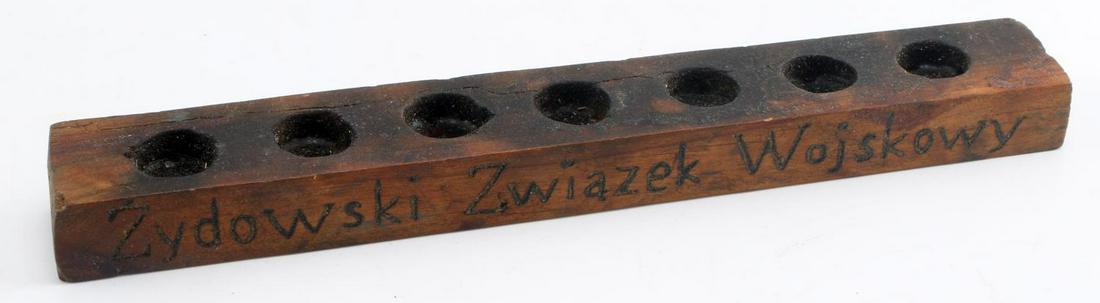 THIRD REICH JEWISH WARSAW GHETTO UPRISING ZZW MENORAH: Wooden menorah inscribed with "Zydowski Zwiakzek Woyskowy" (Jewish Military Union). This underground resistance group took part in the Warsaw Uprising. Menorah has burn marks and is unauthenticated, s