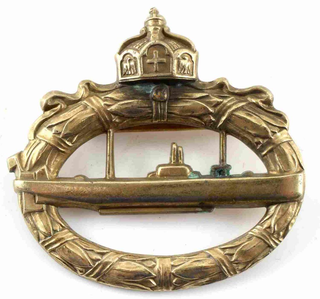 WWI IMPERIAL GERMANY OFFICER TYPE U BOAT BADGE: WWI Imperial Germany Officer Type U Boat Badge. Stamped "800" on the brad pin back for silver. Makers mark of "Walter Schott FEC". There is some oxidation near the Imperial crown and the U boat. Very 