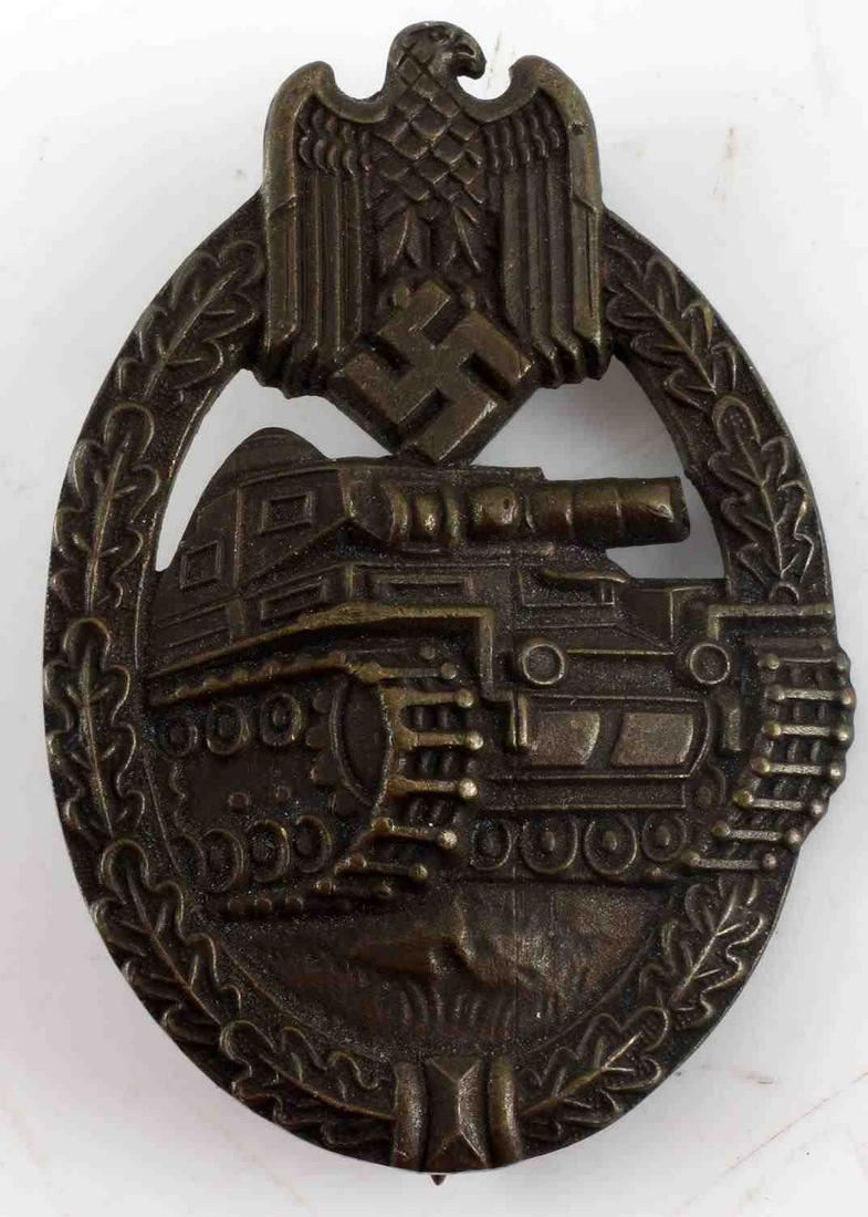 WWII GERMAN THIRD REICH BRONZE PANZER TANK BADGE: Backmarked JFS, straight pin to a point, very good original condition.