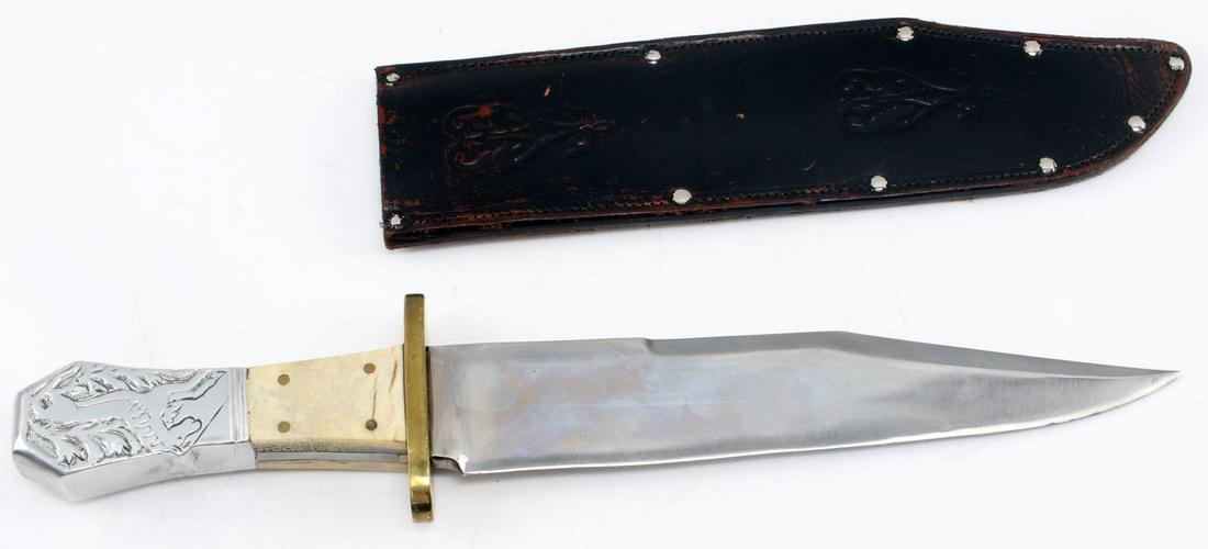 LARGE RUANA BOWIE KNIFE POLISHED BONE HANDLE: Large Ruana Bowie Knife with Polished Bone Handle. The handle is composed of an ornate horse design and polished bone. The pommel is marked "32B Ruana". The leather sheath is marked "Real Hide". Possi