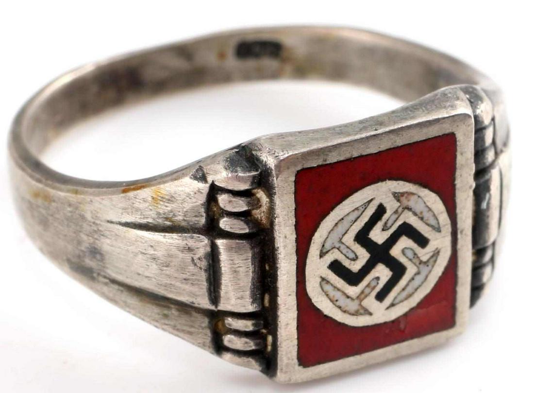 WWII GERMAN THIRD REICH NSDAP GENUINE SILVER RING: WWII German Third Reich NSDAP Genuine Silver Ring. Ring is marked "800" for silver. The ring is a size 8.5. Red enamel face with the NSDAP swastika. Some patina to the inside of the ring. Very good co