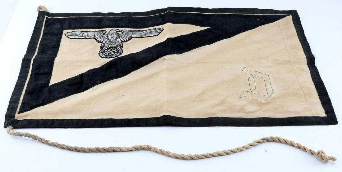 WWII GERMAN SS OFFICE OF COMMANDER FLAG DACHAU: Rectangular flag with Reichsadler and 'D' to each side. Measures 26 X 15 inches. Does not fluoresce with blacklight. This lot has a reserve.