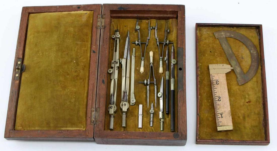ANTIQUE WOOD BOX WITH CUSTOM DRAFTING SET: Has two compartments with lower having tools, box measures 8 by 5 by 2, has lock but no key.