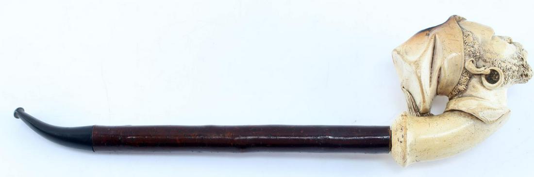 ANTIQUE MEERSCHAUM NEGRO BLACKAMOOR HEAD PIPE: Nice original patination, exceptional detail, reed stem with Bakelite mouth piece, measures 13 inches with stem.