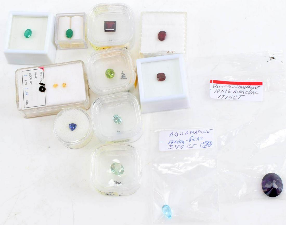 MOISSANITE AMETHYST EMERALD RUBY SAPPHIRE GEMSTONE: Loose gemstone lot 13 stones in total: 1.2ct pink tourmaline, 1.5ct moissanite luisant julep, 4.15ct Prasiolite green amethyst, 1.3ct emerald, 5.25ct rhodolite, 3.85ct aquamarine, 1.15ct emerald, 1 ct