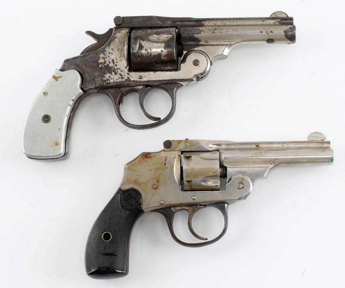 2 US TOP BREAK DA REVOLVERS .38 AND .32 CALIBER: The first has a 3.25 inch barrel with fair clear bore, metal grips, maker marked to top rib, much finish loss. The second is a hammerless with a 3 inch barrel with good clear bore, US bakelite grips, 