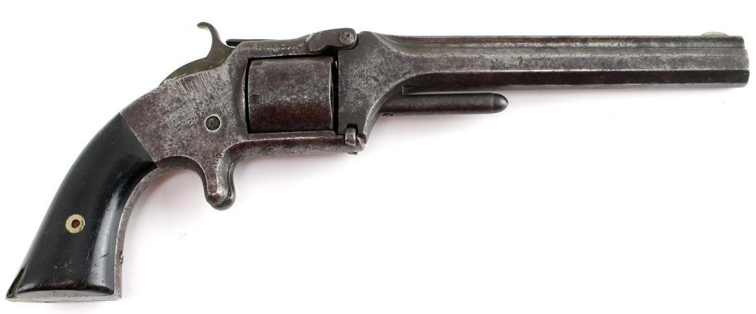 SMITH & WESSON MODEL 2 TIP UP REVOLVER .32 CAL: Scattered patina throughout, maker marked to top rib, serial number to butt, walnut grips, 6 shot, 6 inch barrel with good clear bore, entire piece is loose, little corner loss to each grip, action wo