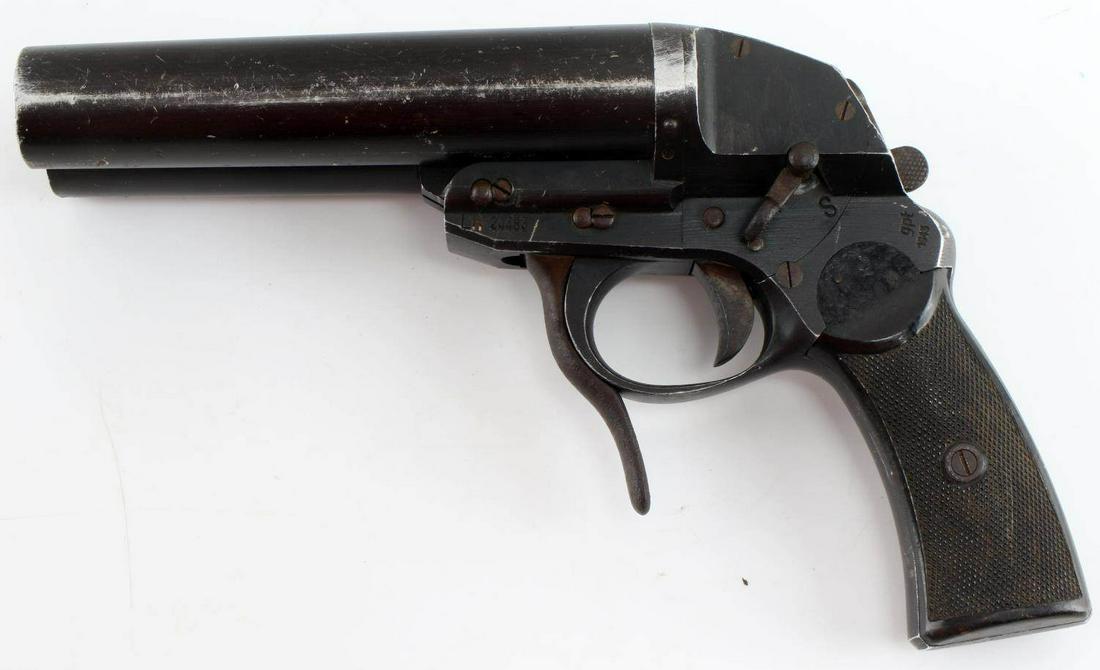 WWII GERMAN THIRD REICH LUFTWAFFE DOUBLE FLARE GUN: Waffenampt marked on each barrel, under barrel switch on frame, GPF date1943, Luft number 24483, S/N 1850, Bakelite grip, excellent rare example. This lot has a reserve.
