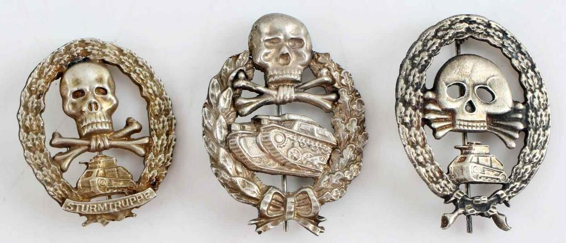 WWII THIRD REICH GERMAN IMPERIAL PANZER BADGES: Lot of three each measuring 2 inches by 1.5 inches, with maker's mark on reverse side. Badges show signs of tarnishing. Unauthenticated, sold as is. This lot has a reserve.