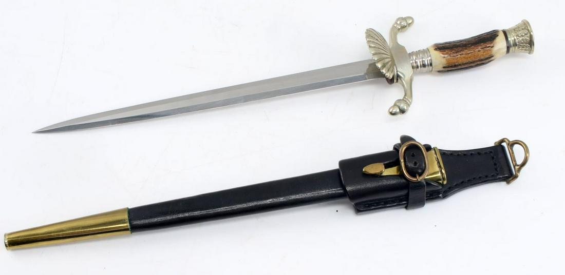 GERMAN HIRSCHFANGER HUNTING DAGGER STAG HANDLE: German Hirschfanger Hunting Dagger with Stag Handle. The blade is marked "S/85". Complete with scabbard. The blade measures 10 inches. The entire dagger measures 14.25 inches long. There is some pitti