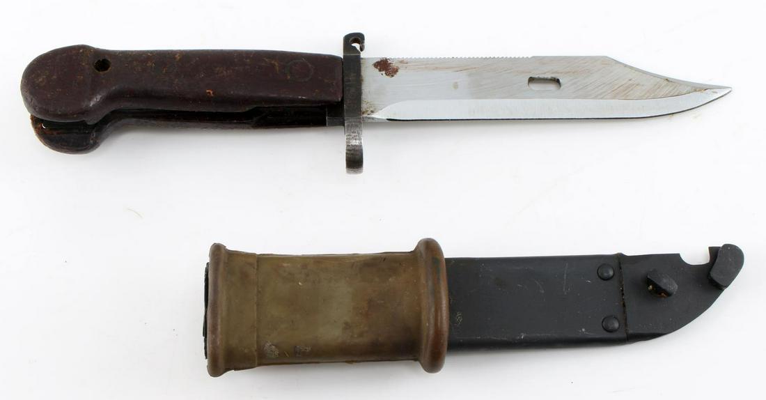 COLD WAR ERA 1960 AK 47 BAYONET & SCABBARD: Cold War era AK 47 bayonet, including rubber frog and metal scabbard, the blade measures 6 inches, 10 inches in total. Both grip and pommel are heavily oxidized. Ricasso has theater etched mark readin