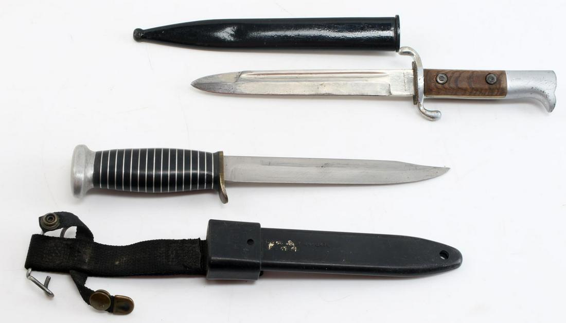WWII GERMAN K98 BAYONET & THEATER MADE KNIFE: WWII German K98 Bayonet and scabbard whereas the handle has been modified and there is no catch. Blade measures 7 inches and 12 inches overall. Scabbard is originally from German boot knife. Object ha