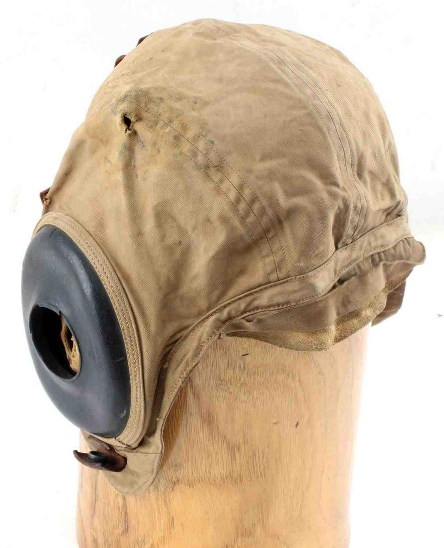WWII UNITED STATES AIR FORCE FLIGHT HELMET: Large Spec AN H 15 Type A 9 Army Air Force cotton flight helmet manufactured by Bates Shoe Company. Inside stamp reads "Army Air Force". Although ear protective pads show some wear, helmet is in good