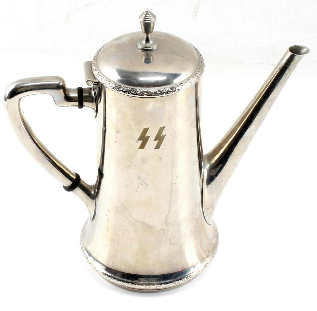 WWII THIRD REICH GERMAN SS JUNKERSCHULE TEA POT: From the SS officer' school just south of Dachau, near Munich, and measuring 9 inches in height. Maker's mark WMF on bottom. Unauthenticated, sold as is.