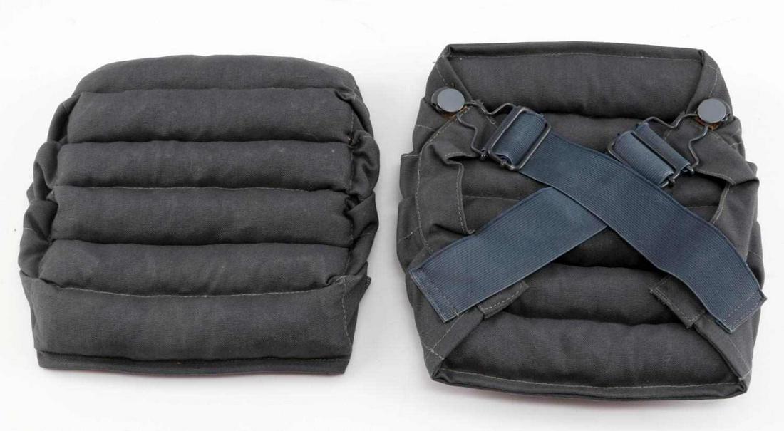 WWII THIRD REICH GERMAN LUFTWAFFE KNEE PADS: Pair of German WWII Luftwaffe Paratrooper Fallschirmjager Knee Pads. They measure 8 .75 inches wide by 8.75 inches tall. Each one has six tubular pads with elastic bands on the reverse side for securi