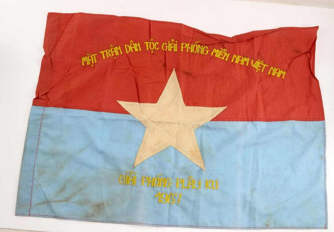 VIETNAM WAR VIET CONG COMBAT BATTLE FLAG: Vietnam Era Viet Cong VC Combat Battle Flag. Measures 28 3/4" wide by 20 1/4" tall. Has a cloth yellow star in the center. The VC writing above and below reads ‘MAT TRAN DAN TOC GIAI PHONG MIEN NAM